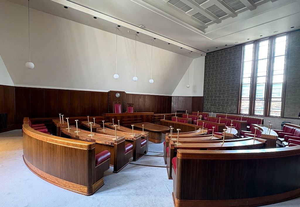 The Council Chamber with the tall windows along one wall